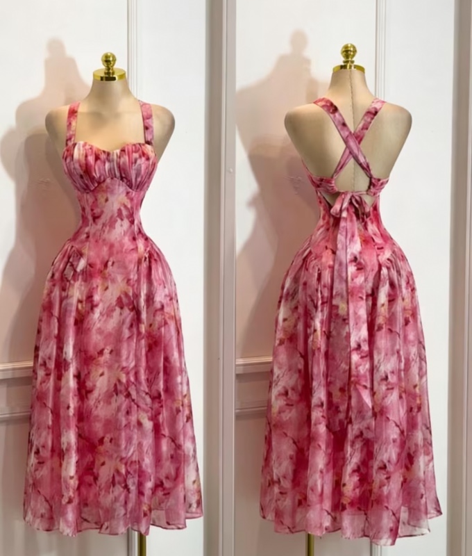 Robe longue élégante et à la mode pour femme à imprimé floral, avec nuque nouée, dos nu et taille cintrée
