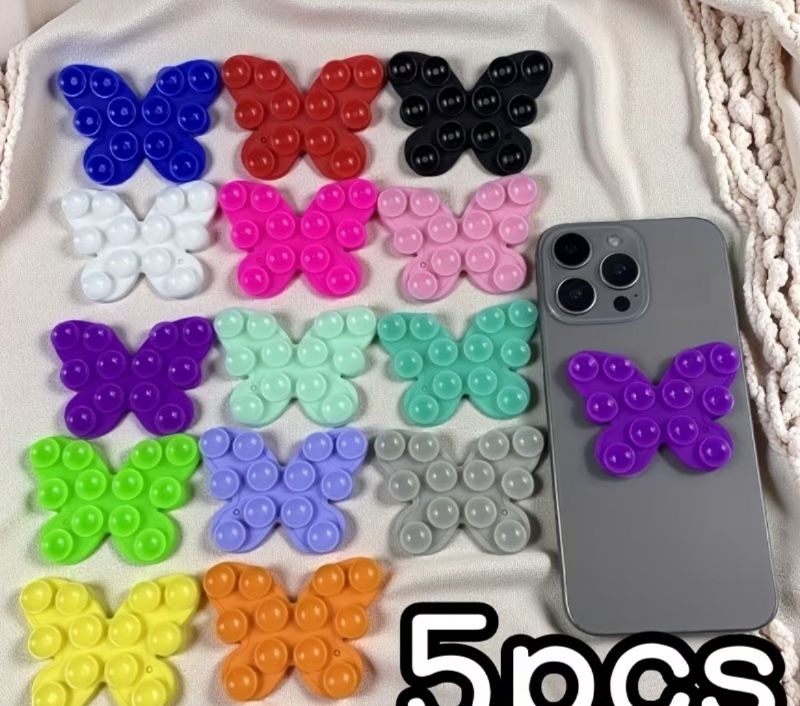 Lot de 5 ventouses pour téléphone papillon de couleur aléatoire. Faciles à retirer, réutilisables et lavables. Convient pour la décoration de téléphone, les supports pour tablette et les poignées de téléphone. Ventouses colorées. Accessoires pour téléphon