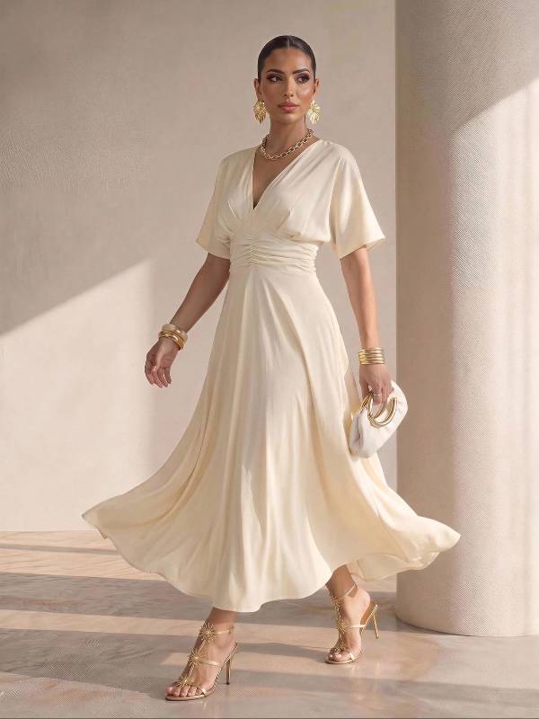 Robe trapèze Xyvia à col en V, épaules tombantes, manches 3/4 et taille cintrée