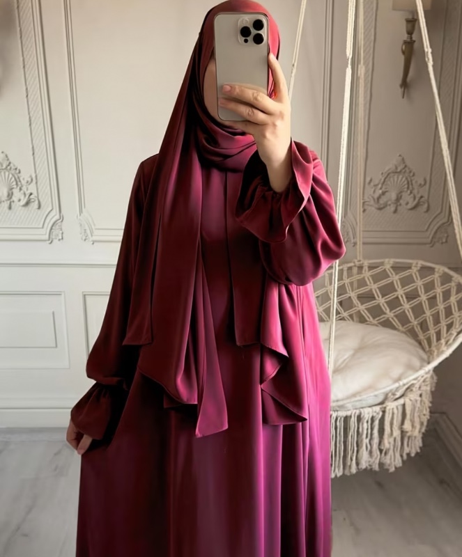 Abaya une pièce pour femme, élégante et décontractée, de couleur unie et dotée de manches amples ; idéale pour le quotidien. Une robe ample et confortable.